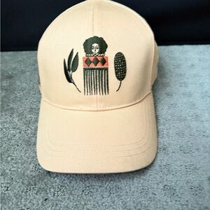 Beige Cap with Afro Comb Design